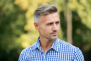 Middle-aged professional man with a refreshed, youthful appearance