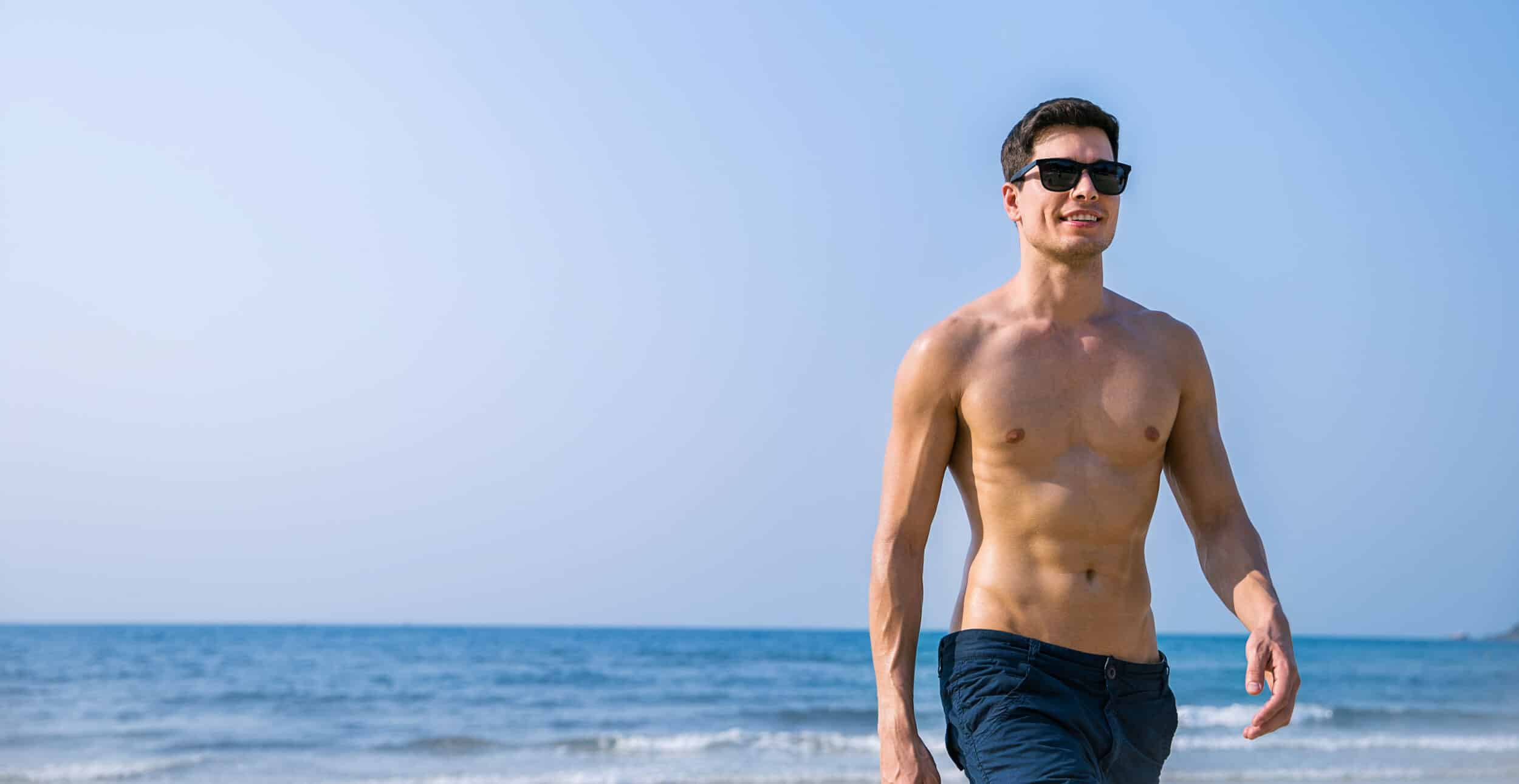 Man displaying a slimmer, more defined physique associated with male body contouring.